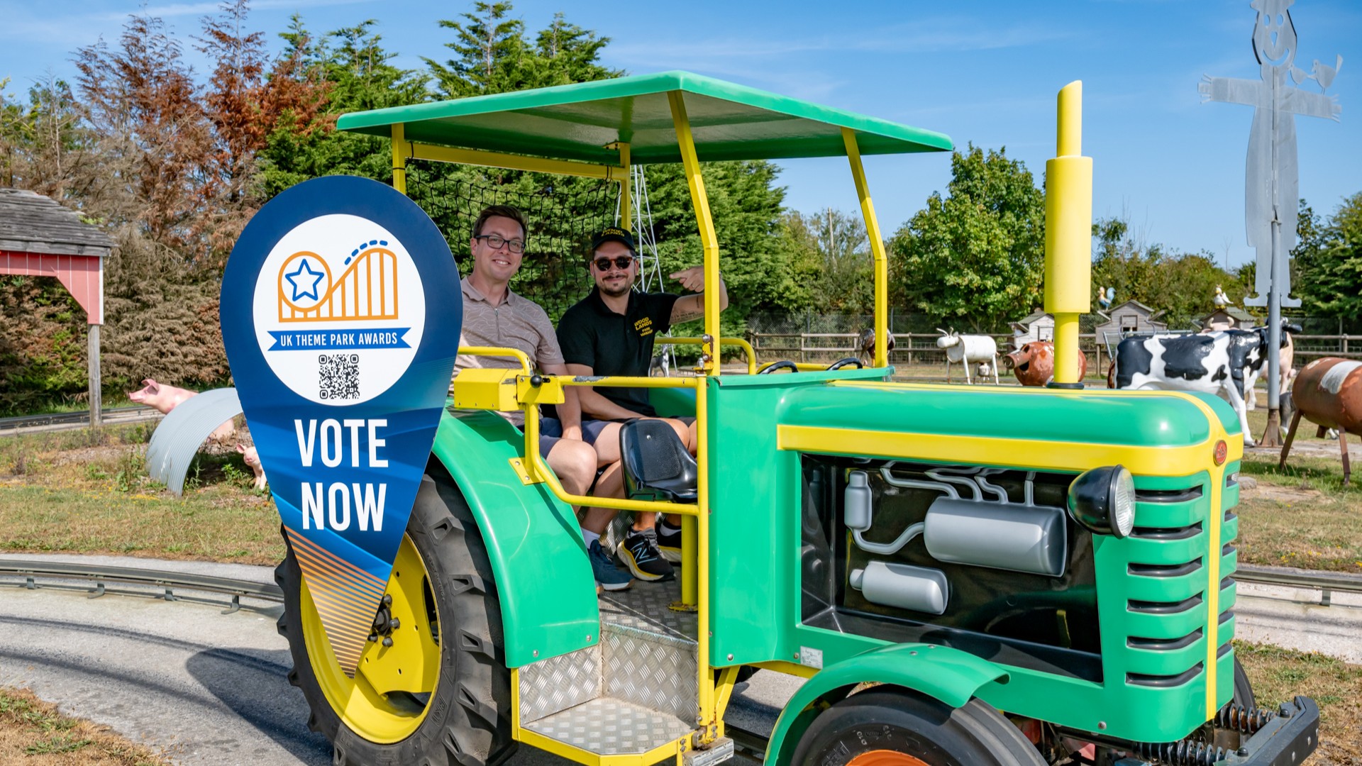 Lawrence Roots and Spiros Spozitos-Tzerams on a ride at Woodlands Family Theme Park